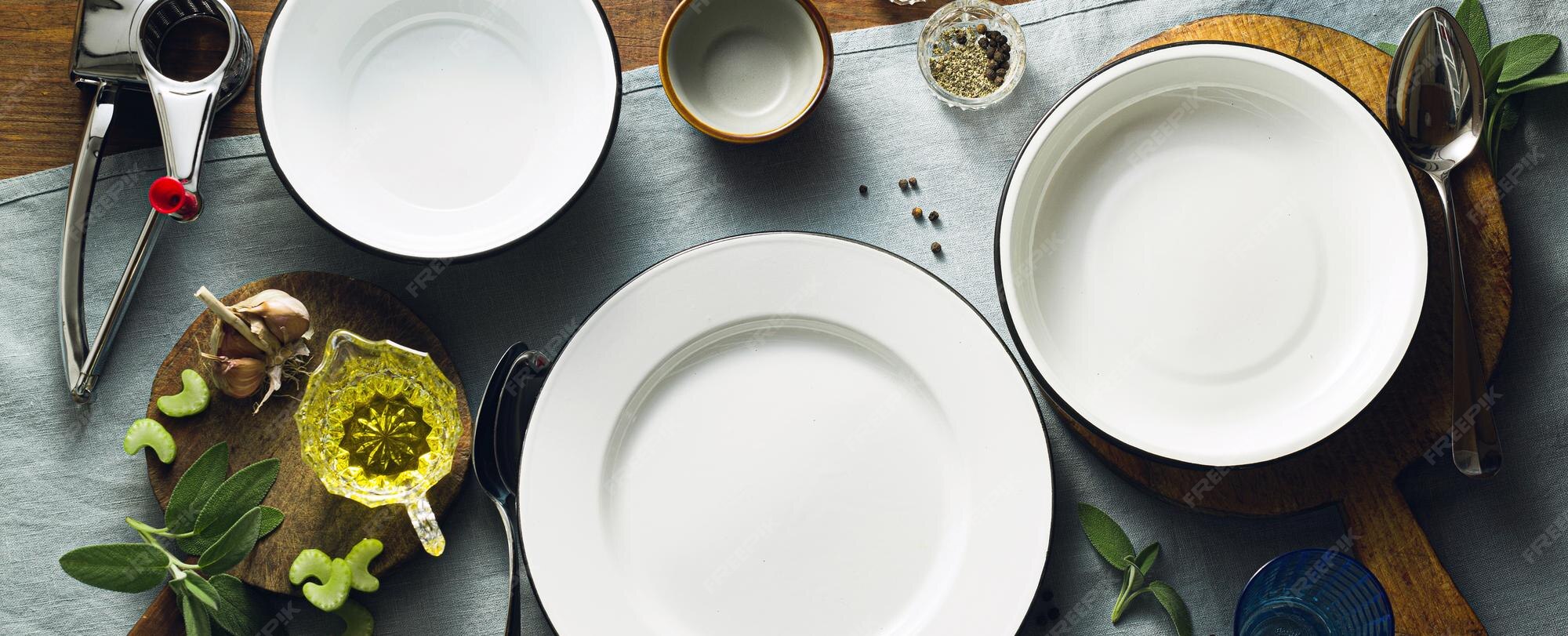 banner-empty-plates-table-set-guests-plates-cutlery-dinner-lunch-styling_230432-1750.jpg